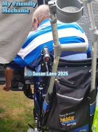 Poem the tired old lady - Wheelchair bound person with text "My Friendly Mechanic" and "© Susan Lane 2025"