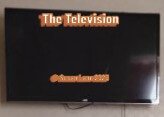 The unwatched television, waiting and hoping, symbolic of grief and technology 
© Susan Lane 2025